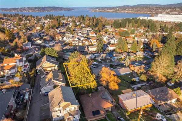 an aerial view of residential building and trees