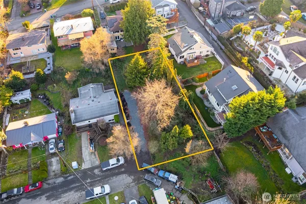 an aerial view of residential building with an outdoor space