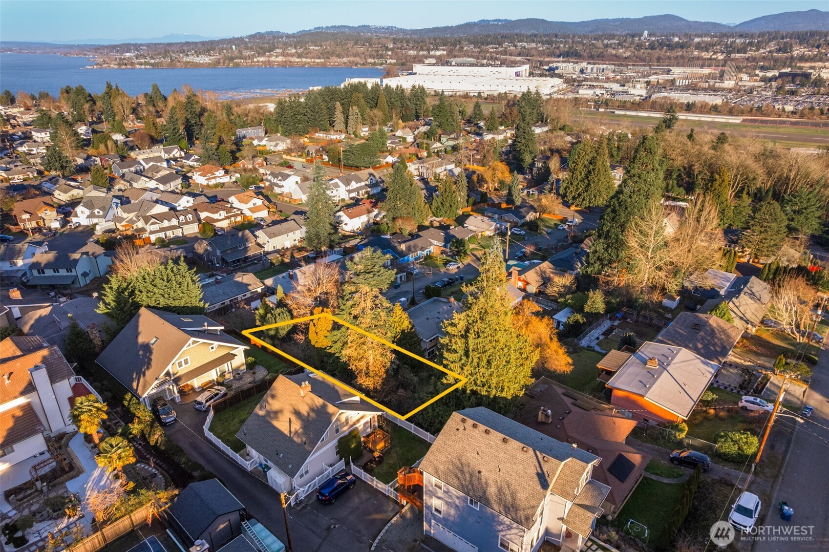 8519 South 123rd Place Seattle, WA 98178 - Photo 14 of 18 an aerial view of residential building with an outdoor space