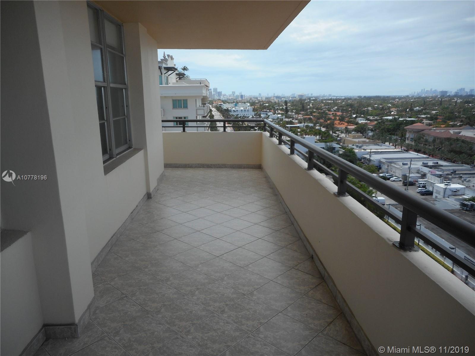 9511 Collins Avenue, Unit 1209 Surfside, FL 33154 - Photo 2 of 20 a view of a kitchen with a sink