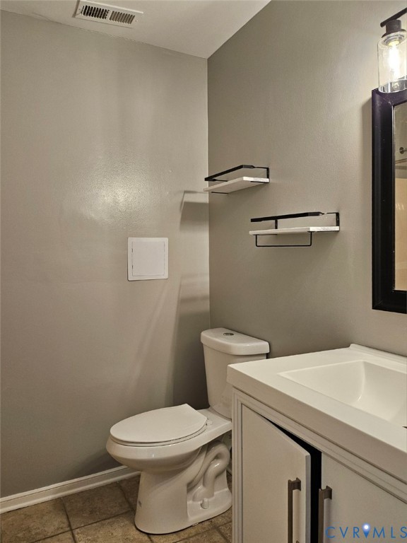 13607 Danwoods Road Midlothian, VA 23113 - Photo 17 of 19 a bathroom with a sink and toilet