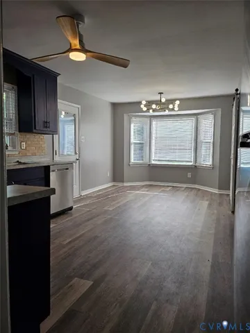 a view of kitchen and windows