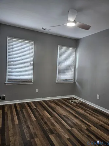 a bedroom with bed and window