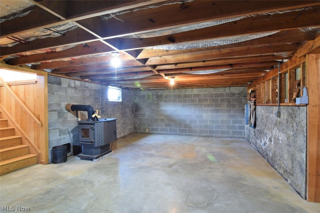 15227 Leroy Road Thompson, OH 44086 - Photo 42 of 50 Pellet stove