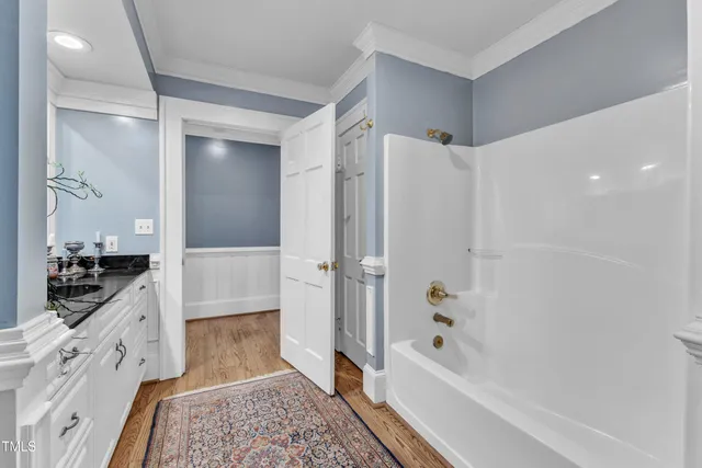 a kitchen with stainless steel appliances a sink stove and refrigerator