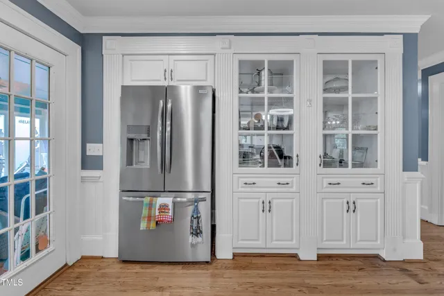 a view of staircase with white walls