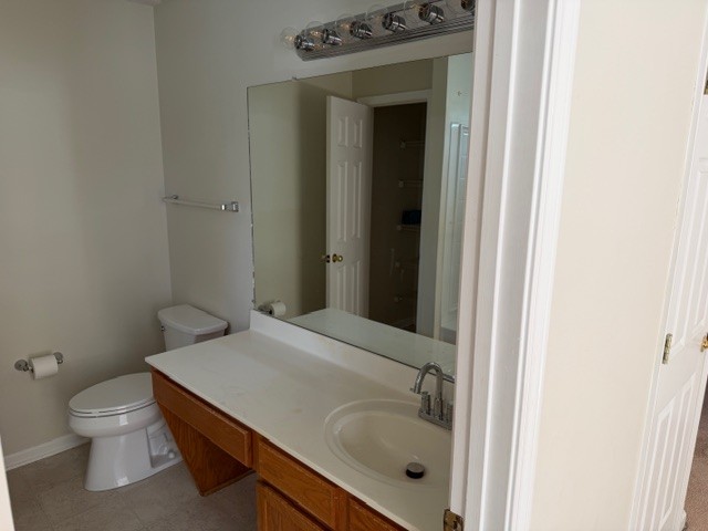 2004 Upland Drive Franklin, TN 37067 - Photo 8 of 11 a bathroom with a sink a toilet and shower
