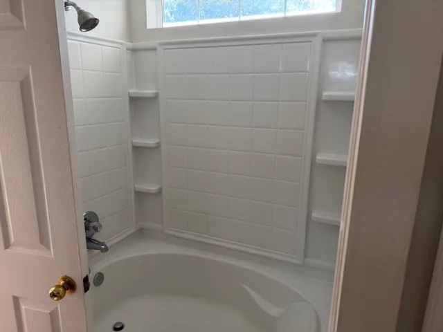 a bathroom with a bathtub