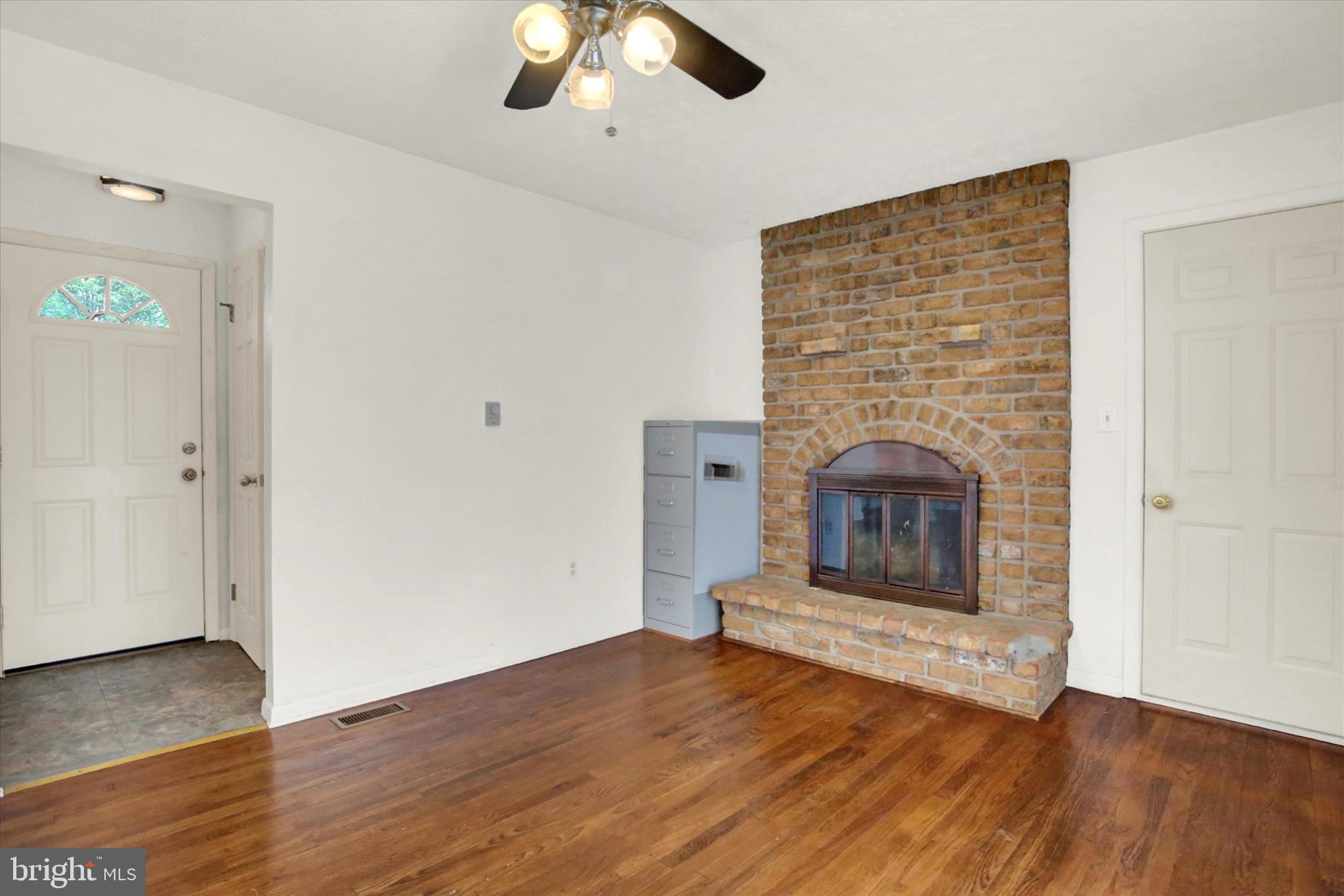 429 North Scenic Road Harrisburg, PA 17109 - Photo 6 of 37 Family room with real brick fireplace.