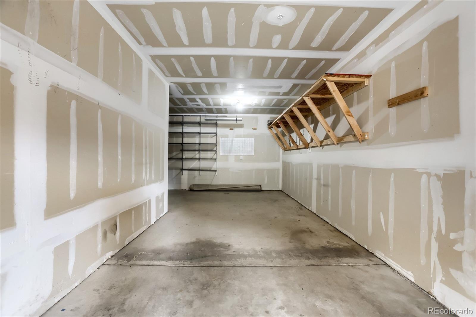 6232 Kilmer Loop, Unit 203 Golden, CO 80403 - Photo 26 of 33 a view of an empty room with stairs