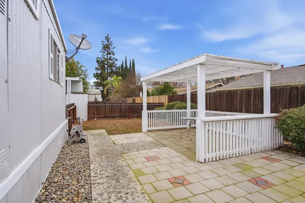a balcony view with a garden space