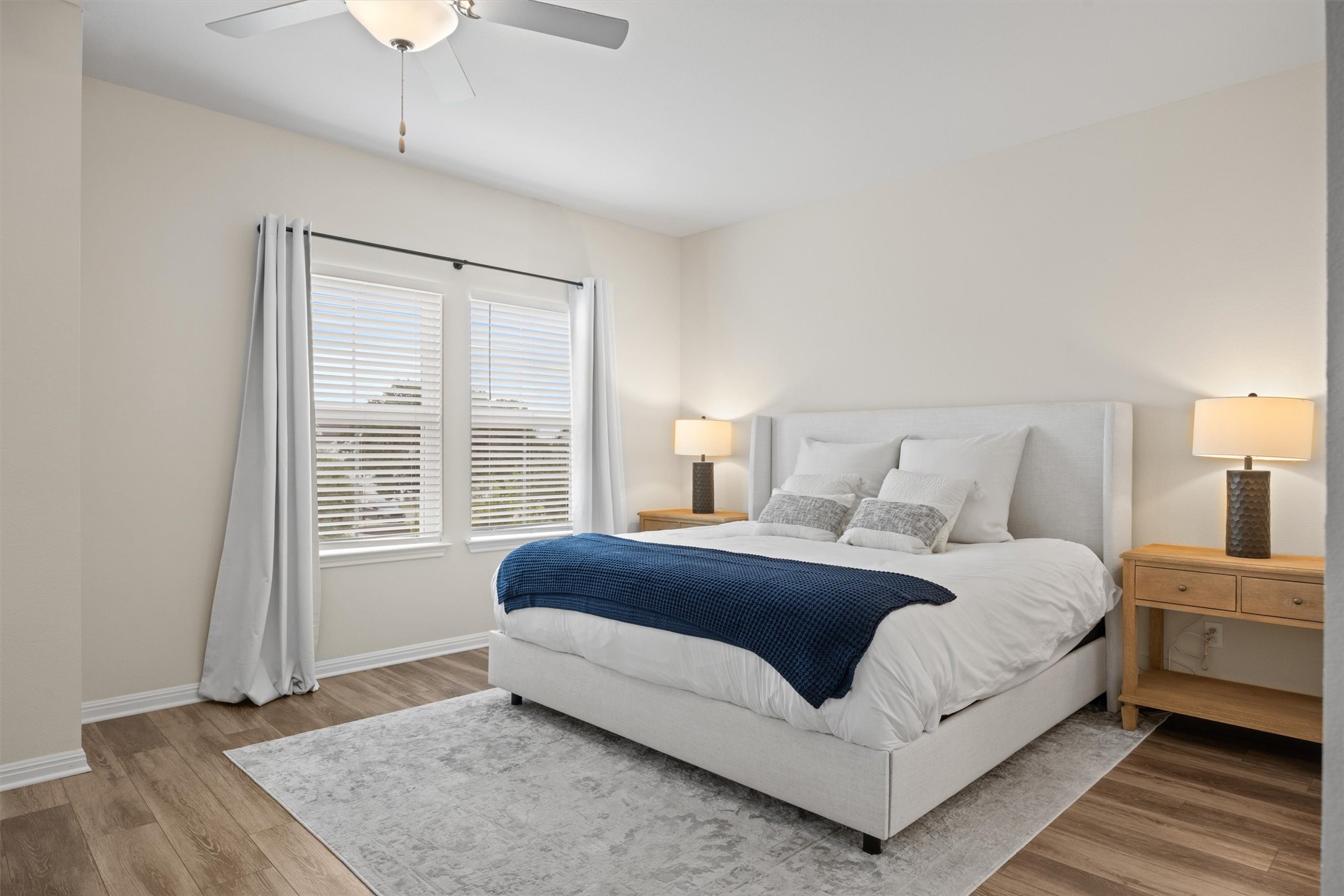 313 Toddy Way Leander, TX 78641 - Photo 16 of 39 Primary Bedroom with light wood-type flooring and ceiling fan
