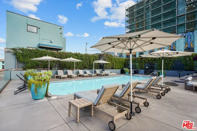 a view of a terrace with furniture and stove