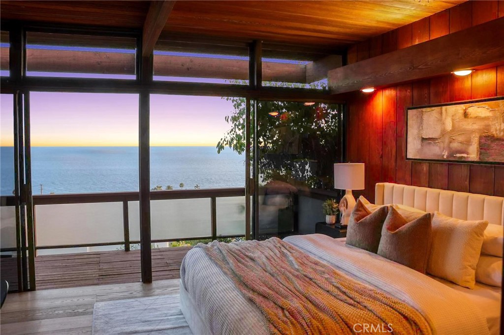 394 Pinecrest Drive Laguna Beach, CA 92651 - Photo 12 of 24 a bedroom with a bed and a window
