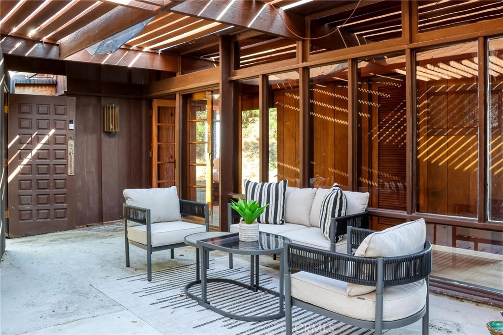 394 Pinecrest Drive Laguna Beach, CA 92651 - Photo 17 of 24 a view of patio with a chairs and tables