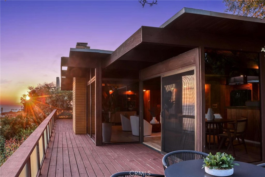 394 Pinecrest Drive Laguna Beach, CA 92651 - Photo 4 of 24 a view of a balcony with a potted plants