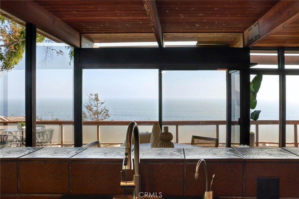 394 Pinecrest Drive Laguna Beach, CA 92651 - Photo 9 of 24 a view of kitchen with granite countertop window