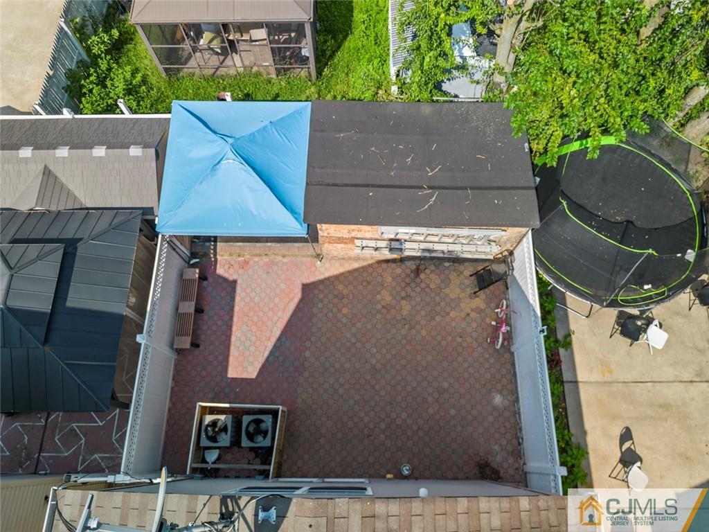 381 Prospect Street Perth Amboy, NJ 08861 - Photo 11 of 51 an aerial view of a house with a yard