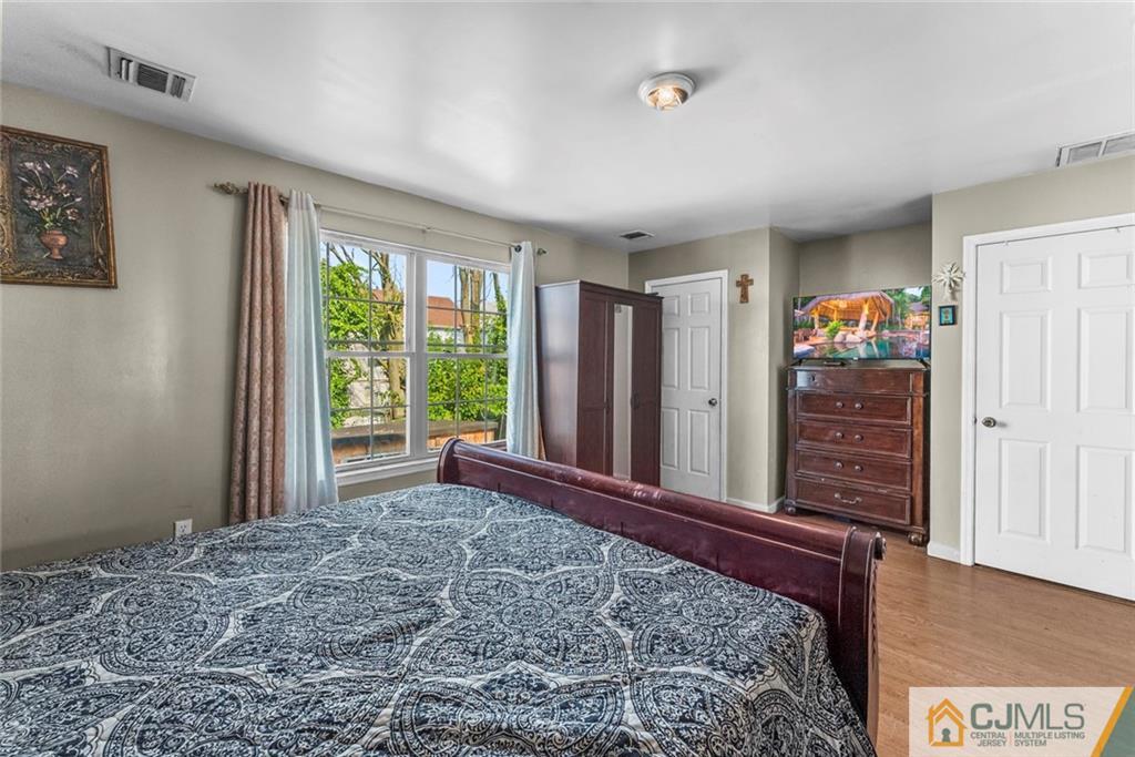381 Prospect Street Perth Amboy, NJ 08861 - Photo 28 of 51 a view of a room with furniture and window