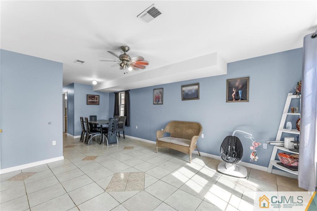 381 Prospect Street Perth Amboy, NJ 08861 - Photo 31 of 51 a view of a livingroom with furniture