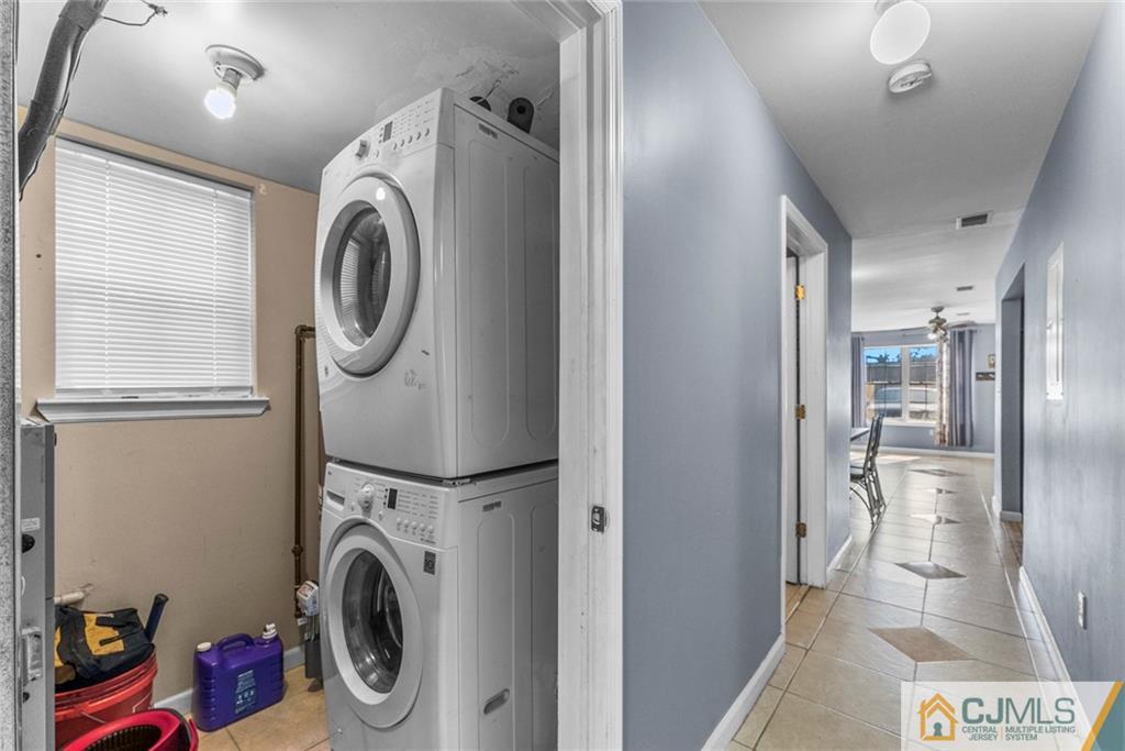 381 Prospect Street Perth Amboy, NJ 08861 - Photo 43 of 51 a utility room with dryer and washer