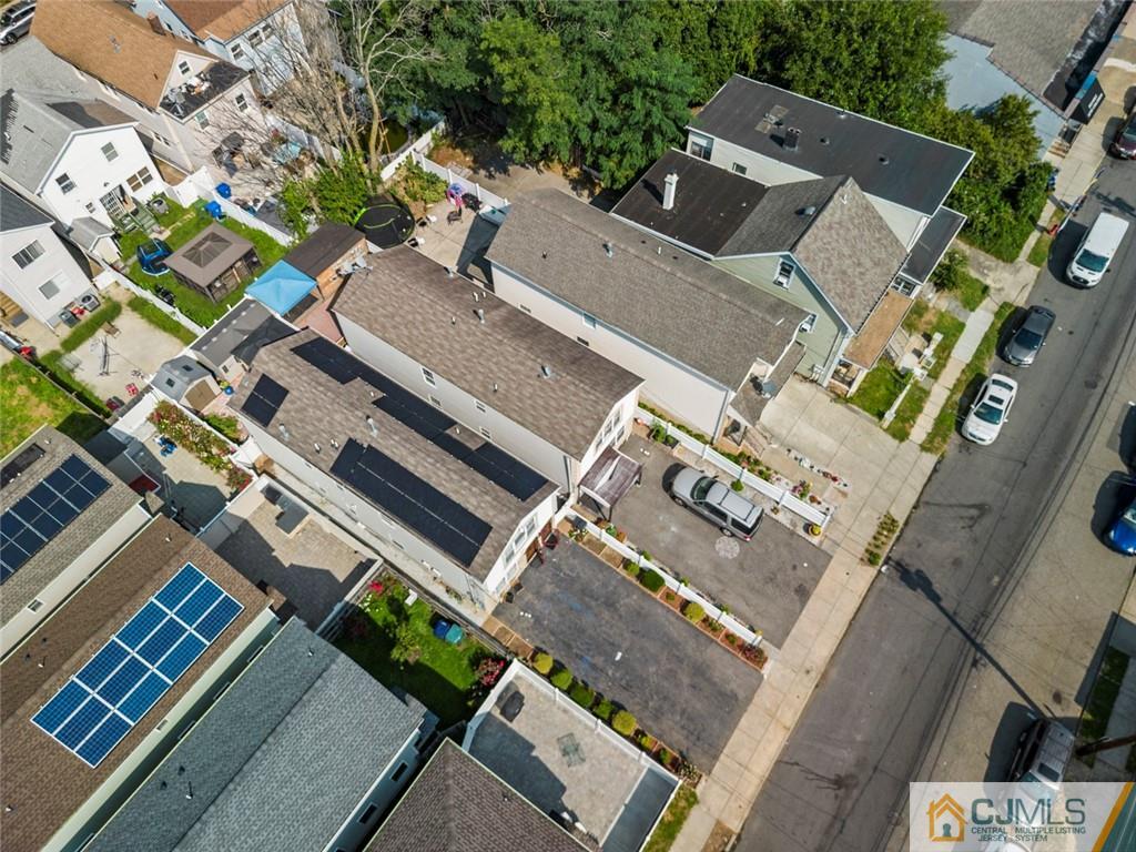 381 Prospect Street Perth Amboy, NJ 08861 - Photo 10 of 51 an aerial view of a house with a yard