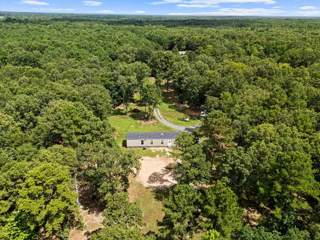 a view of a yard with an outdoor space