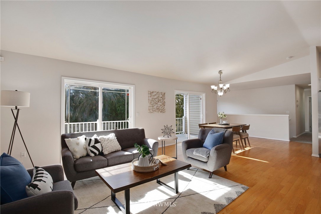 801 Southwest 3rd Place Renton, WA 98057 - Photo 2 of 28 a living room with furniture and a large window