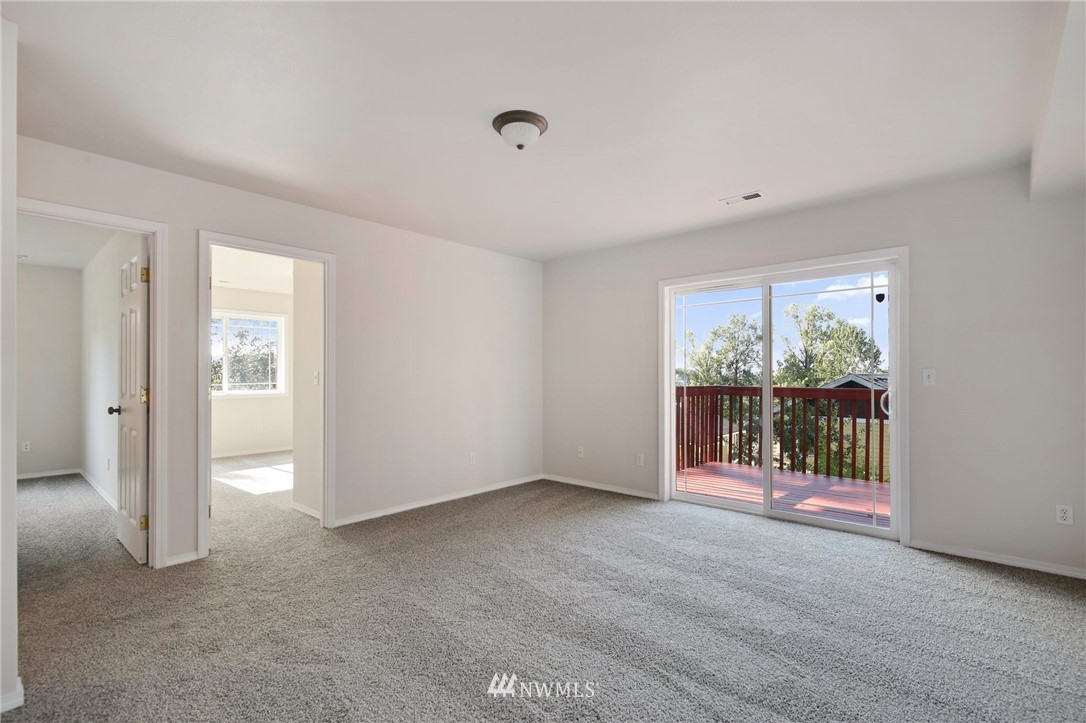 801 Southwest 3rd Place Renton, WA 98057 - Photo 21 of 28 a view of an empty room with a window