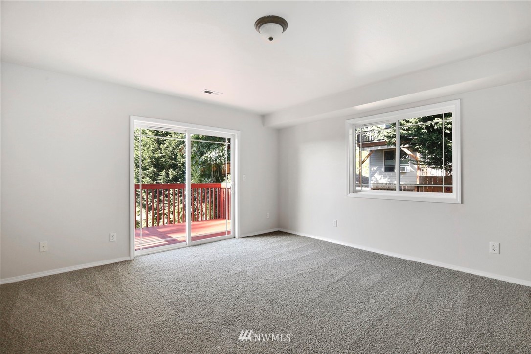 801 Southwest 3rd Place Renton, WA 98057 - Photo 23 of 28 an empty room with windows