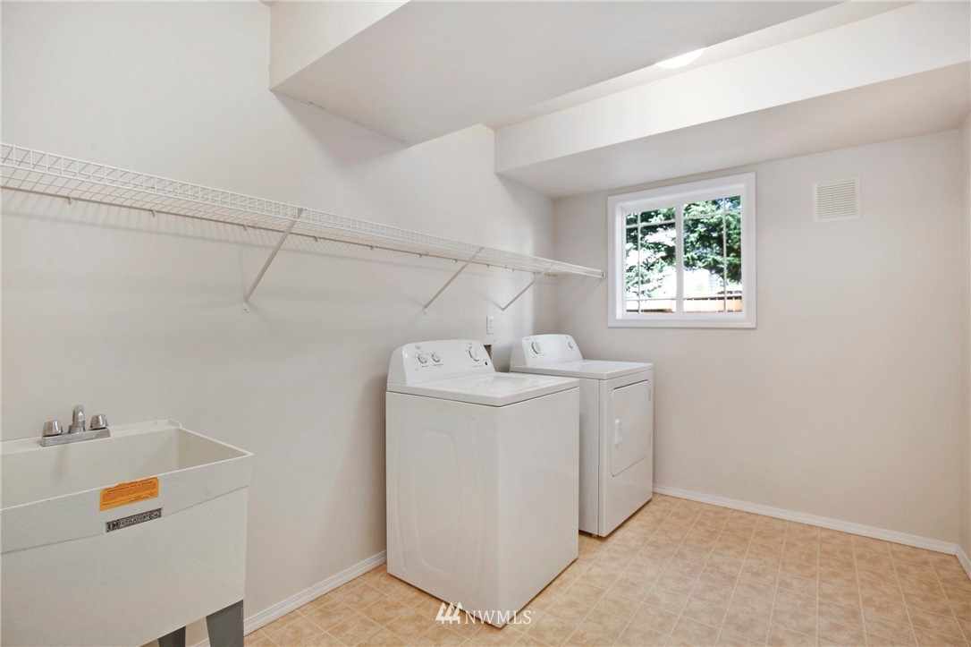 801 Southwest 3rd Place Renton, WA 98057 - Photo 25 of 28 a utility room with dryer and washer