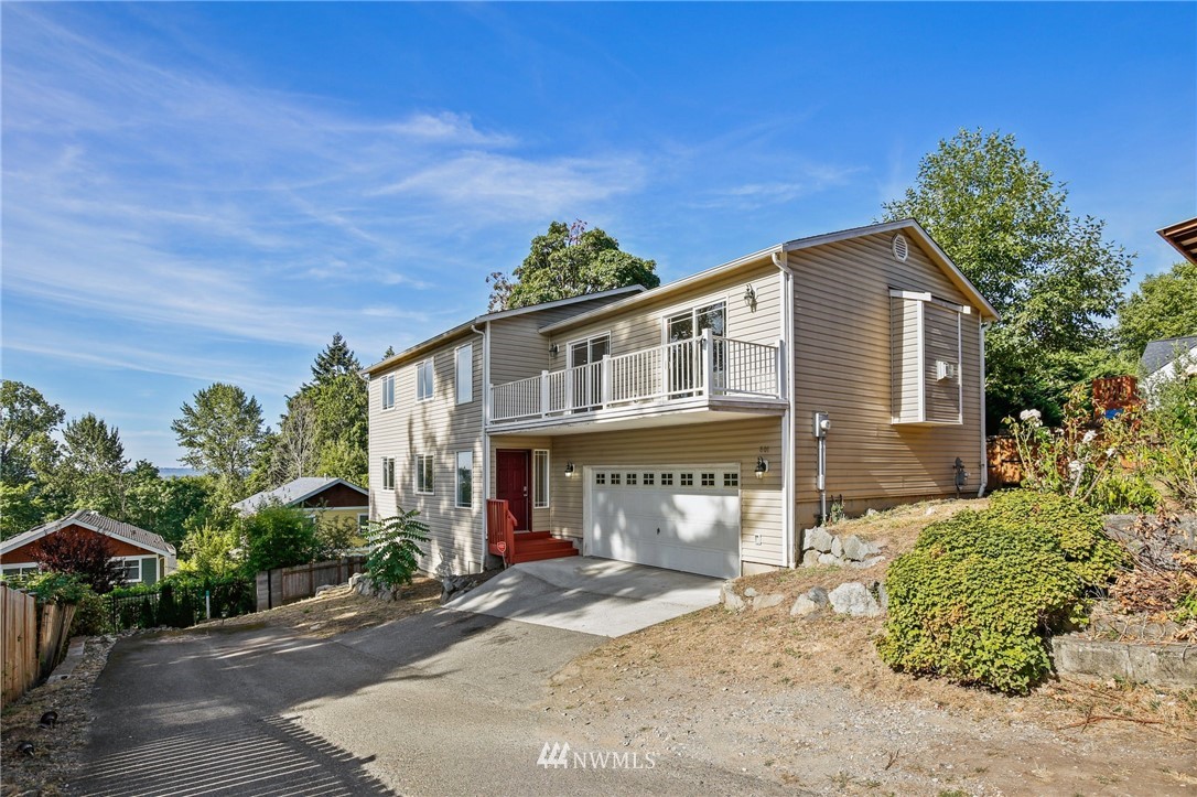 801 Southwest 3rd Place Renton, WA 98057 - Photo 28 of 28 a front view of a house with a yard