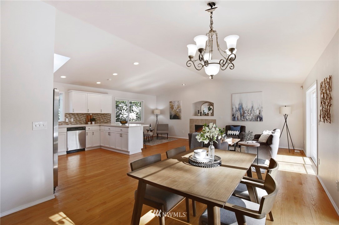 801 Southwest 3rd Place Renton, WA 98057 - Photo 7 of 28 a view of a dining room with furniture and wooden floor