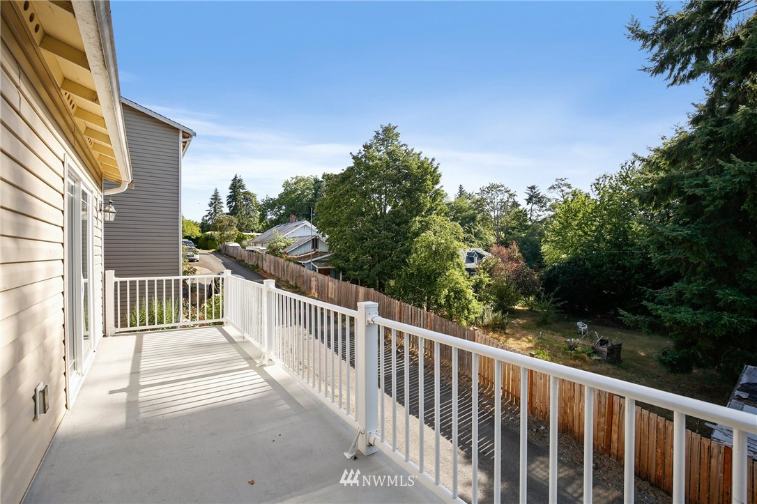 801 Southwest 3rd Place Renton, WA 98057 - Photo 9 of 28 a view of a balcony with trees
