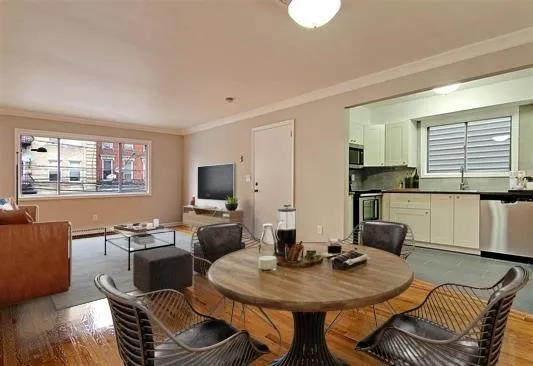 a view of a dining room with furniture