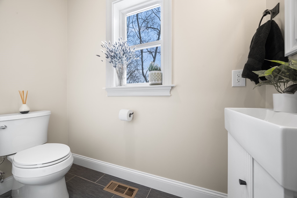 40 Bates Road Framingham, MA 01702 - Photo 12 of 25 a bathroom with a toilet and a sink