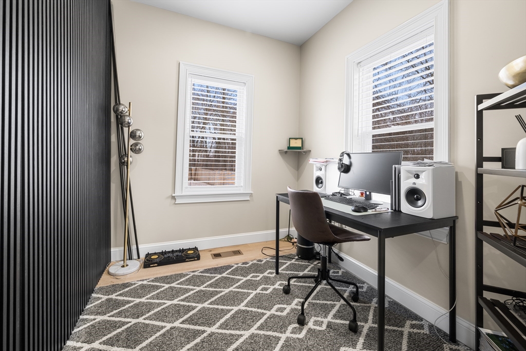 40 Bates Road Framingham, MA 01702 - Photo 13 of 25 a view of a workspace with furniture and a window