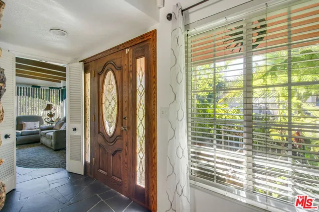 $1,450,000 | 4425 Don Miguel Drive, Los Angeles, CA 90008