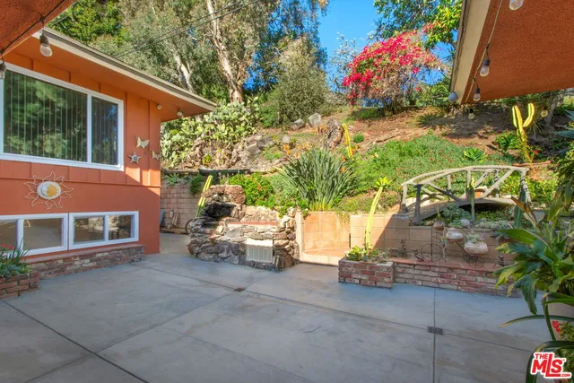 $1,450,000 | 4425 Don Miguel Drive, Los Angeles, CA 90008