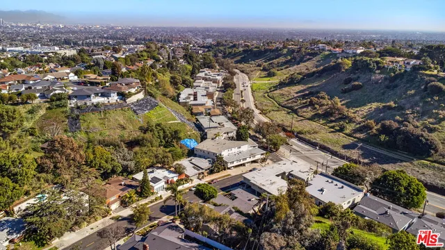 $1,450,000 | 4425 Don Miguel Drive, Los Angeles, CA 90008