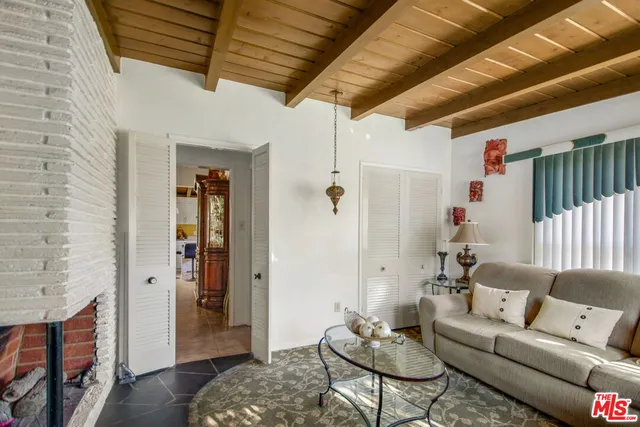 $1,450,000 | 4425 Don Miguel Drive, Los Angeles, CA 90008