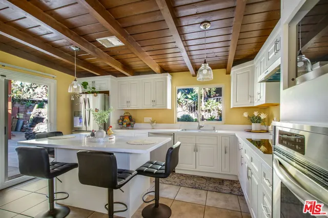 $1,450,000 | 4425 Don Miguel Drive, Los Angeles, CA 90008