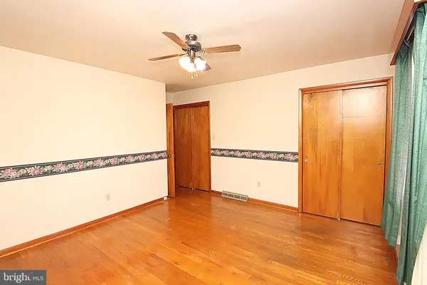 a view of a room with an empty space
