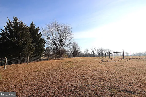 a backyard of apartments with trees