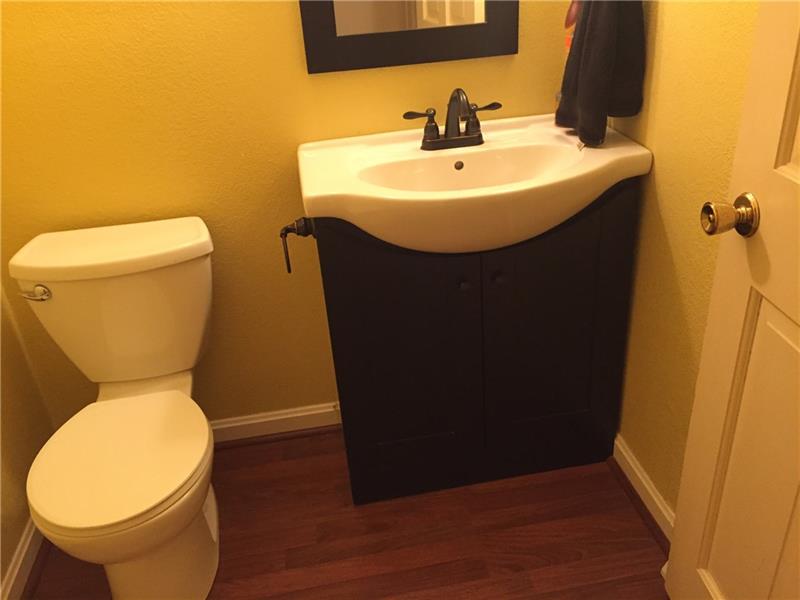 735 Koonce Road Hermitage, PA 16148 - Photo 13 of 25 HALF BATH ON MAIN LEVEL HAS EASY ACCESS TO BACKYARD