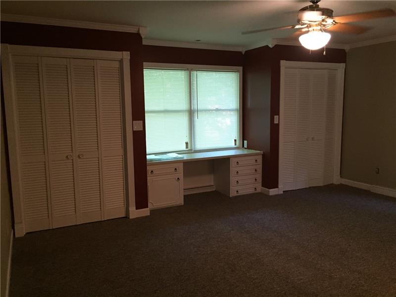 735 Koonce Road Hermitage, PA 16148 - Photo 14 of 25 MASTER BEDROOM HAS BUILT-INS, DOUBLE CLOSETS AND CROWN MOLDING