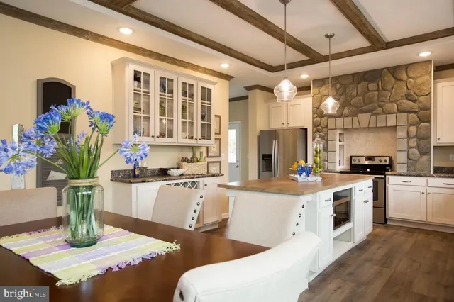 a kitchen with sink and stove
