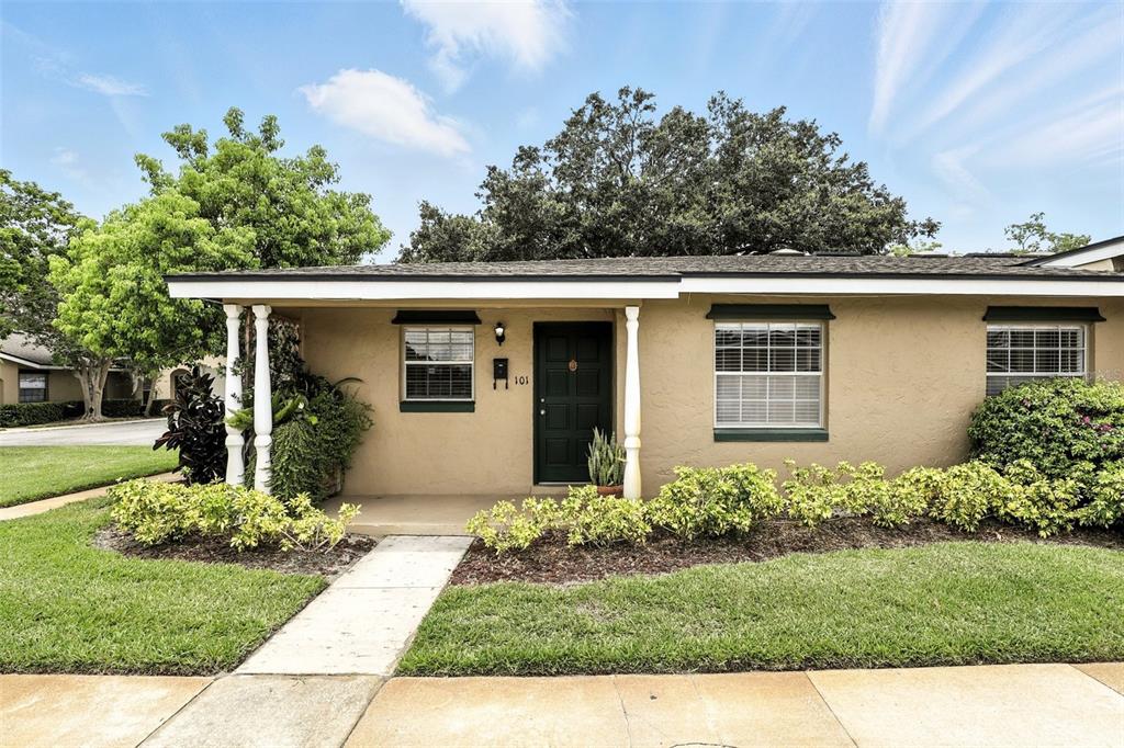 207 Esplanade Way, Unit 101 Casselberry, FL 32707 - Photo 1 of 1 a view of a house with a yard