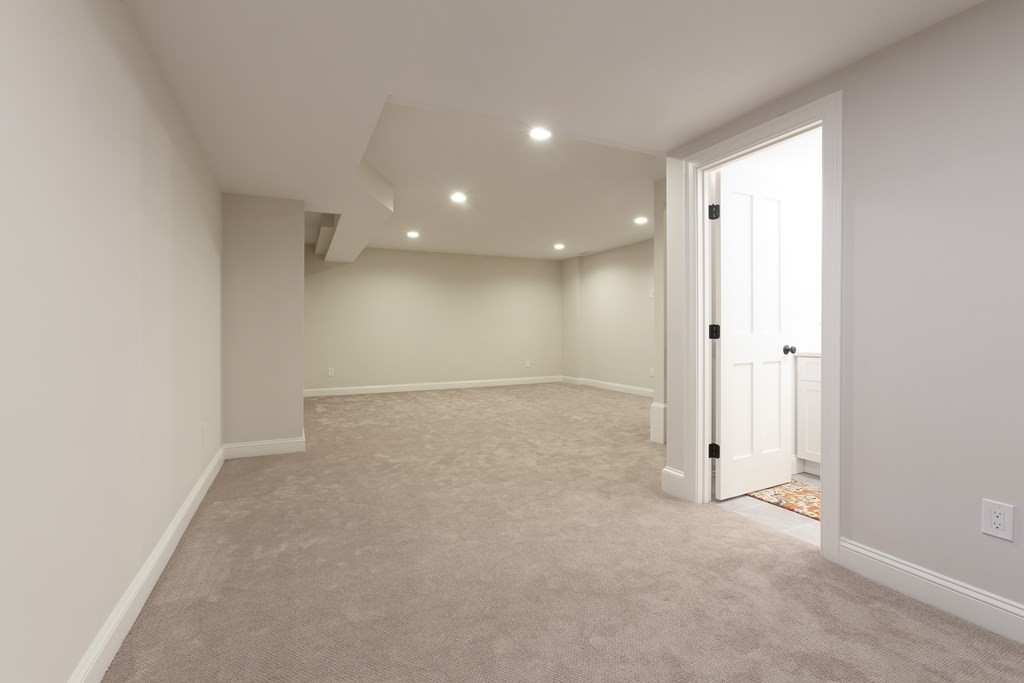 211 West Street, Unit 211 Needham, MA 02494 - Photo 28 of 29 an empty room with a natural light