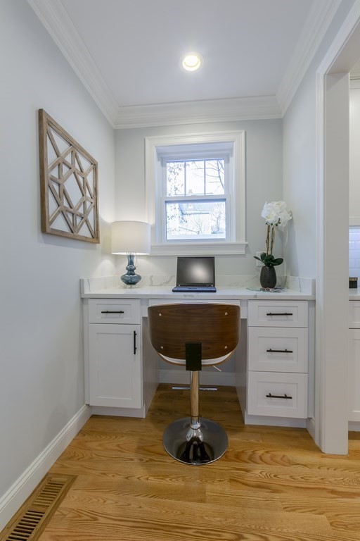 211 West Street, Unit 211 Needham, MA 02494 - Photo 5 of 29 a kitchen with a stove a sink and a window